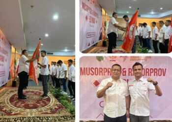 Fachruddin Siregar, S.T.,M.T Ketua ESI Rohul terima bendera petaka dari Brigjenpol. Bambang Hery Sukmajadi, S.H,.S.I.K Ketua ESI Riau.