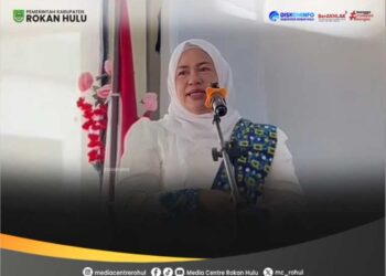 Ketua TP. PKK Rokan Hulu Hadiri Penyaluran 165 Paket Bantuan di Kegiatan BKMT Ujung Batu